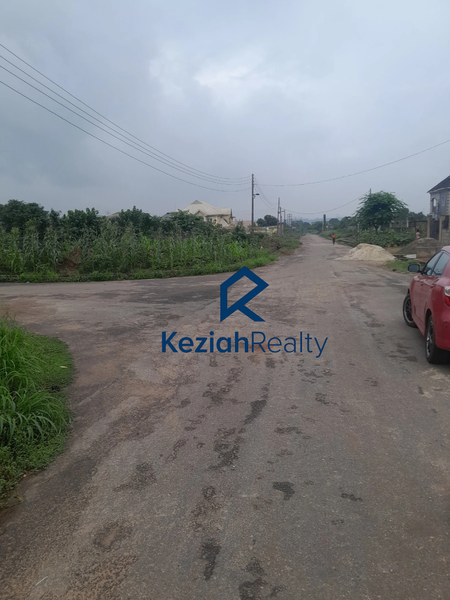 Street view of prime full plot for sale in GRA 3 Odonla Odogunyan Ikorodu Lagos